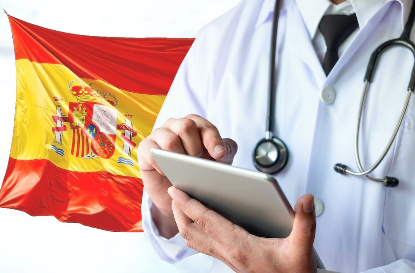 Doctor with stethoscope and Spanish flag — Spain healthcare system for expats 2026
