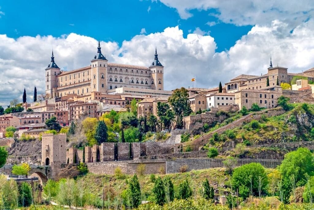 Buying property in Spain 2026 — Toledo cityscape showing Spain's historic architecture and property market